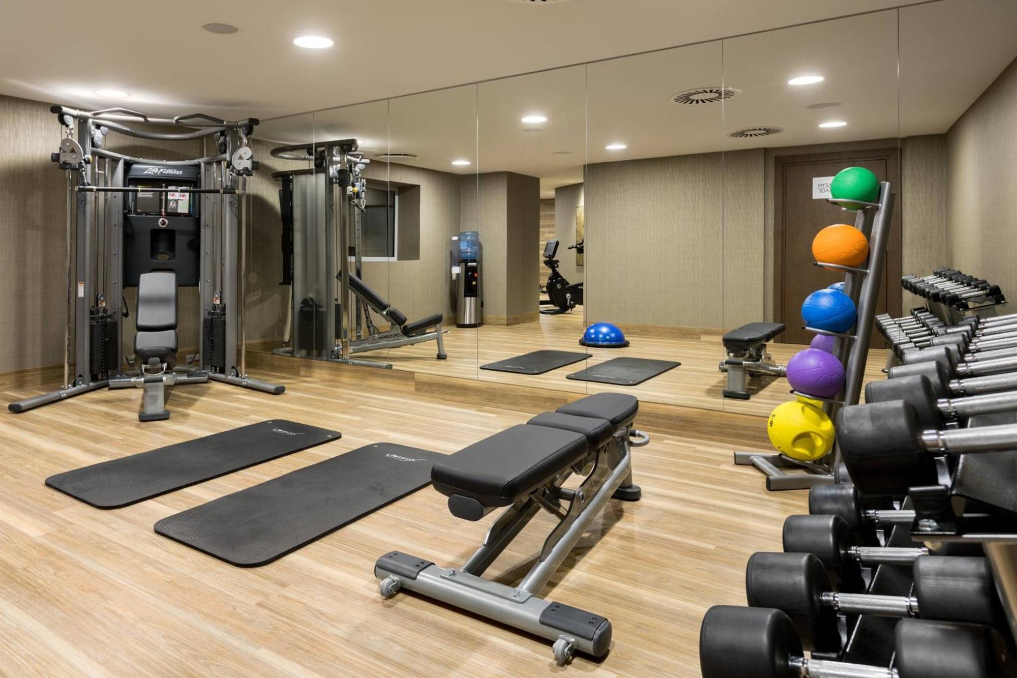 Ac Hotel By Marriott Wroclaw Exterior photo The gym at the hotel