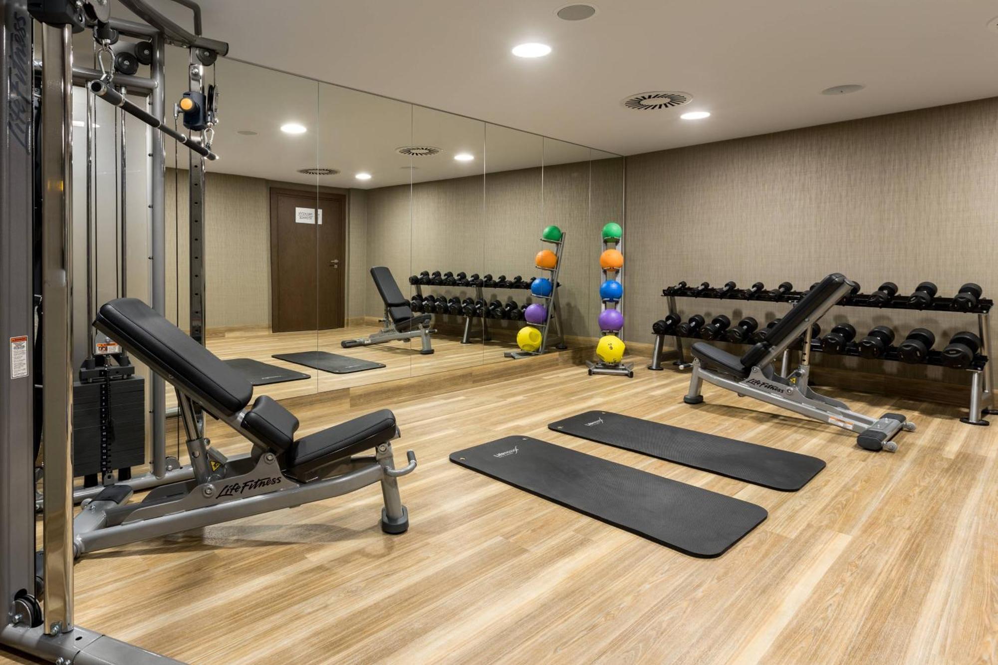 Ac Hotel By Marriott Wroclaw Exterior photo The gym at the hotel