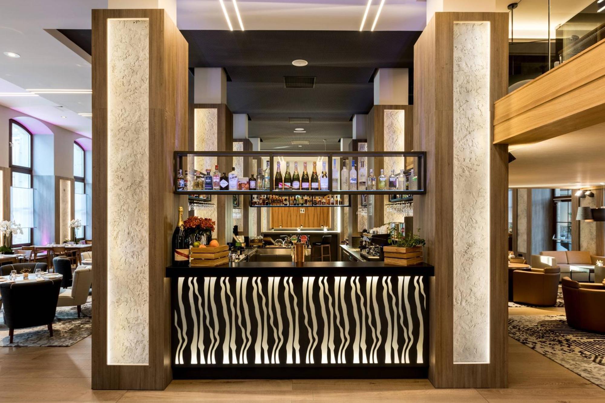 Ac Hotel By Marriott Wroclaw Exterior photo The bar at the restaurant