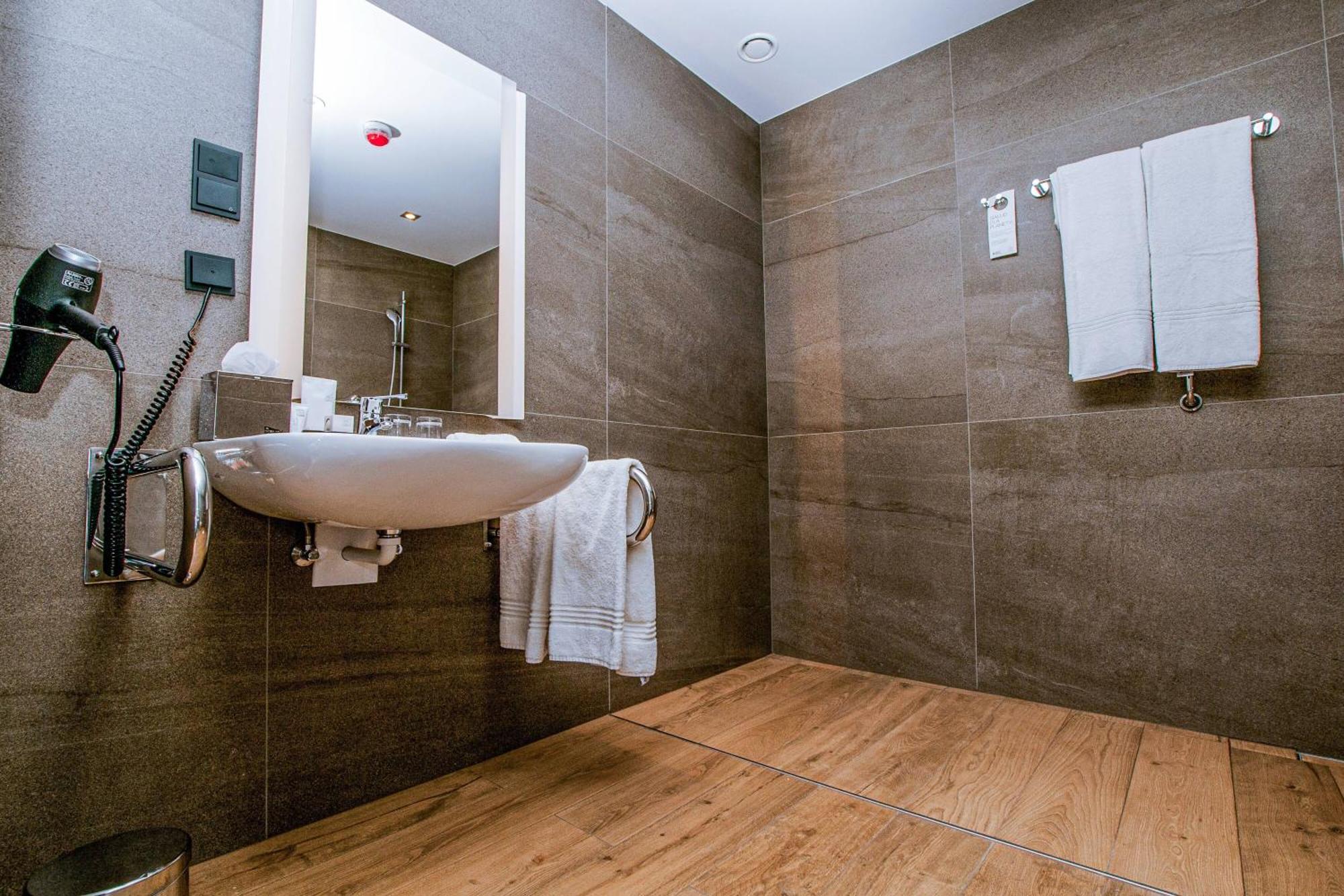 Ac Hotel By Marriott Wroclaw Exterior photo Bathroom of a hotel room