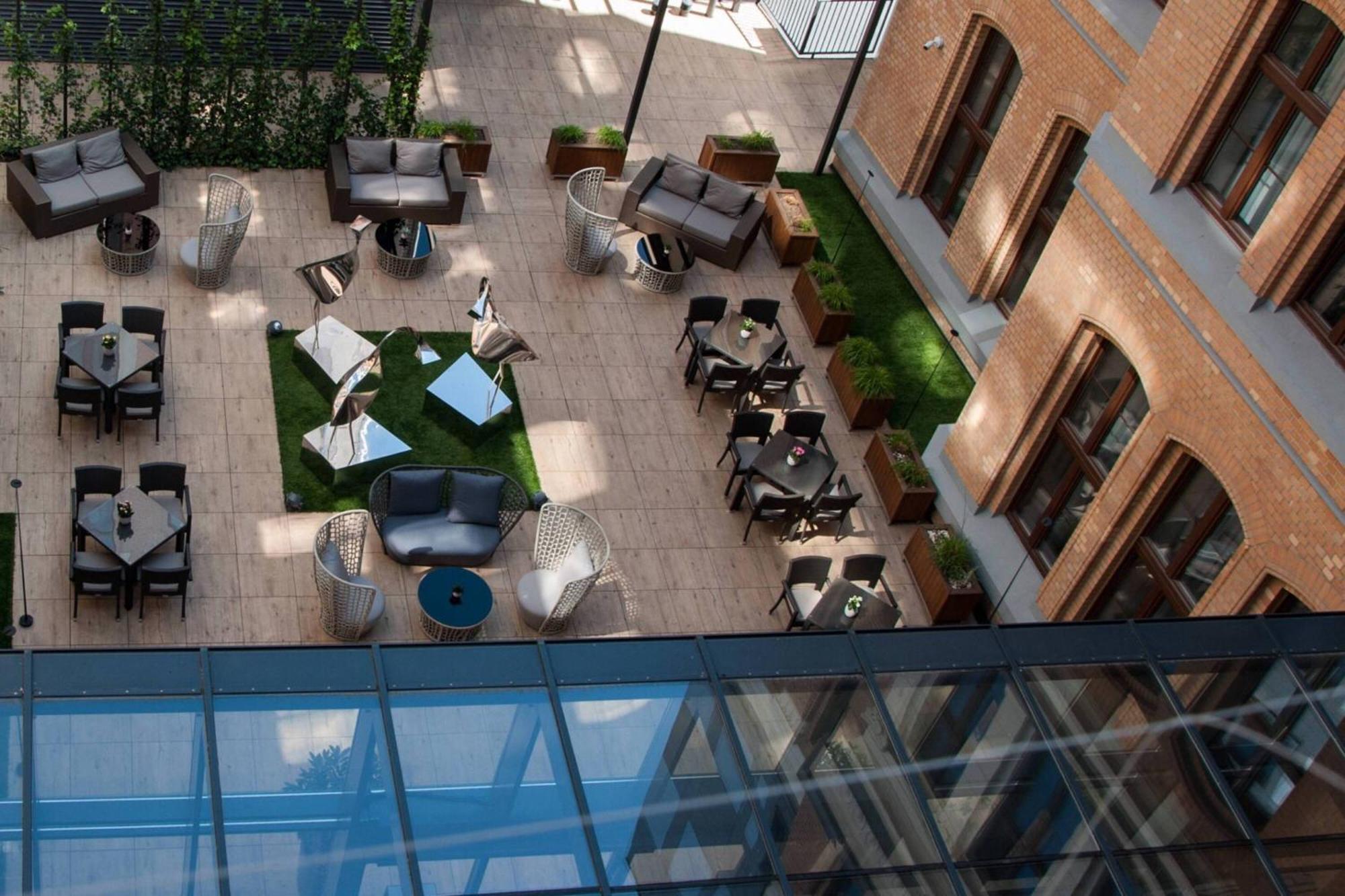 Ac Hotel By Marriott Wroclaw Exterior photo The courtyard of the hotel